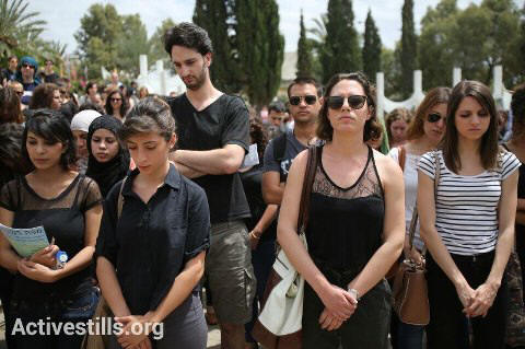 An event to commemrate the Nakba, Tel Aviv university, 13.5.2013

Palestinian and Israeli students standing during a minute of silence commemorating the Nakba, as part of a ceremony that was held by Palestinian and Israeli students in the entrance to the Tel Aviv University, May 13, 2013. A right wing demonstration was held against the ceremony, as the protestors were shouting slogans against the participants, under police surveillance. 

Photo by: Oren Ziv/Activestills.org